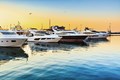 Marine boats lined up at dock